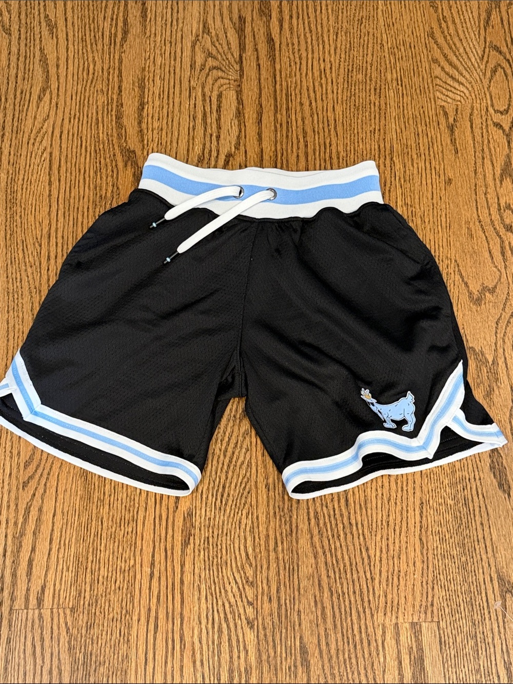 Kids Black Athletic Shorts with Light Blue Trim